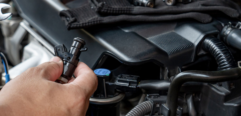 Read more about the article 6 Clear Signs You Need a Fuel Injector Service